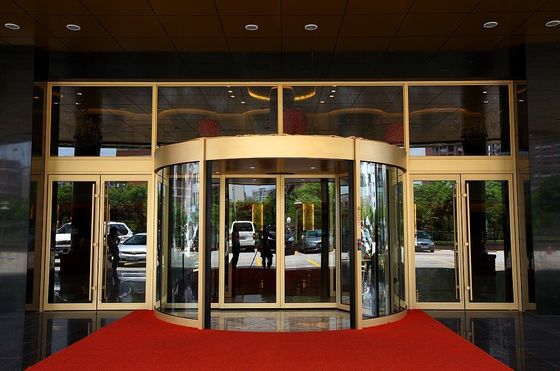 Çin Luxurious building entrance Automatic curved sliding door Of Aluminium / steel frame Fabrika